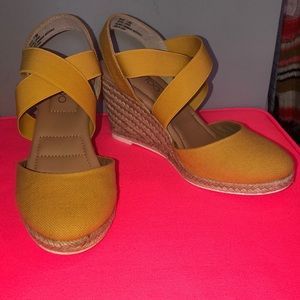 Yellow closed toe wedges